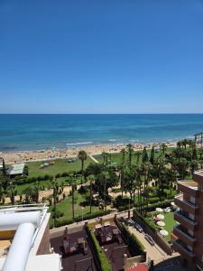 a view of the beach from the balcony of a building at acapulco 3 frontal in Oropesa del Mar