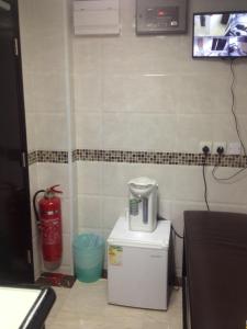 Dapur atau dapur kecil di Manhattan Guesthouse