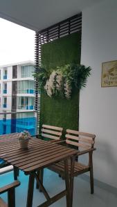 Bazén v ubytování My Resort Hua Hin D605 By Chutha nebo v jeho okolí