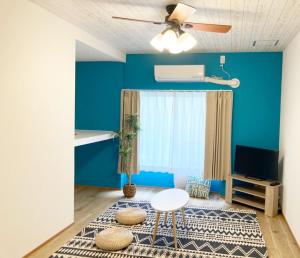 TV a/nebo společenská místnost v ubytování Seaside Pension Petit Shirahama