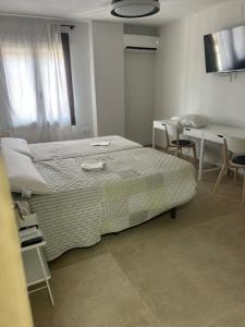 Postel nebo postele na pokoji v ubytování Los Cipreses