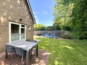 En have udenfor Apartment Boszicht 6 by Interhome + 21 billeder