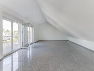 an empty room with white walls and large windows at Airport Apartment 24 in Rüsselsheim