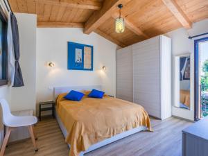 Ένα ή περισσότερα κρεβάτια σε δωμάτιο στο Holiday Home Il Fienile di Leo by Interhome