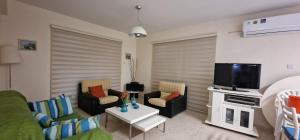 Ruang duduk di Retire holiday apartment