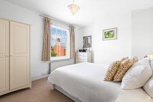 Postel nebo postele na pokoji v ubytování Bakersfield Retreat