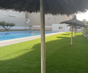 The swimming pool at or close to "Mi Casina" Apartamento Turistico en San Juan de Alicante