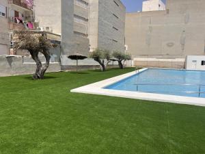 The swimming pool at or close to "Mi Casina" Apartamento Turistico en San Juan de Alicante