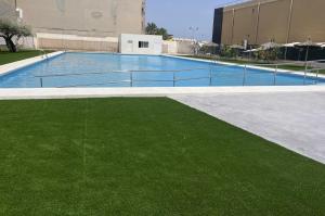 The swimming pool at or close to "Mi Casina" Apartamento Turistico en San Juan de Alicante