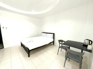 Ένα ή περισσότερα κρεβάτια σε δωμάτιο στο Patong Canal Villa R108