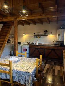 Kuchyň nebo kuchyňský kout v ubytování Cabaña Bigua