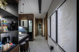 a kitchen with a wall with a design on it at Super Luxury SweetHome in Medina