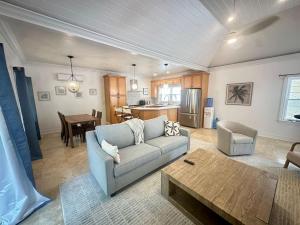 a living room with a couch and a table at Seabreeze Villa in Georgetown