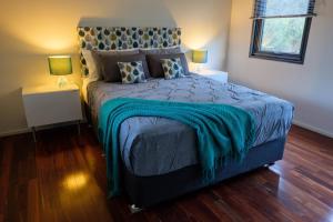 Postel nebo postele na pokoji v ubytování Hartzell One Seven