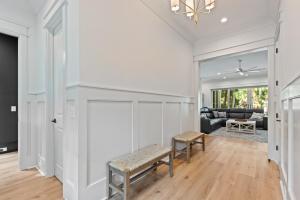 a living room with a bench and a couch at 3290 Coon Hollow in Seabrook Island