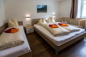 Postel nebo postele na pokoji v ubytování Haus Sandeck