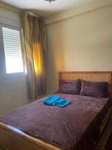 Ένα ή περισσότερα κρεβάτια σε δωμάτιο στο quiet house center agadir +37 φωτογραφίες