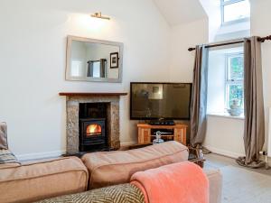 Et tv og/eller underholdning på Corrennie School Cottage