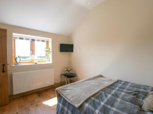 Ένα ή περισσότερα κρεβάτια σε δωμάτιο στο 1 Bed in Stapleton 75147