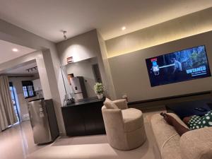 Gallery image of Home2Suite by Veronica Bunga-Buziga-Munyonyo- Luxury with Netflix, DStv, Wi-Fi, & Free Parking in Kampala +37 photos