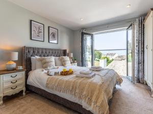 Ένα ή περισσότερα κρεβάτια σε δωμάτιο στο 3 Bed in Ilfracombe 48133 +62 φωτογραφίες