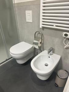 Koupelna v ubytování K23 rooms + 6 fotografií