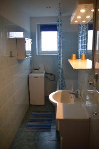 Koupelna v ubytování Apartament Dark Amber- 3 rooms grand piano