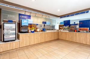 a store with a cashier counter in a store at Holiday Inn Express & Suites Florida City-Gateway To Keys by IHG in Florida City
