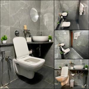 a bathroom with a toilet and a sink at Lake View 2 BHK in Powai A in Mumbai