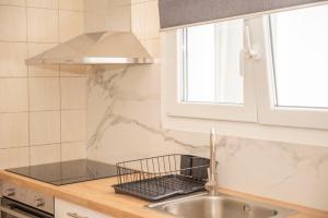 Nhà bếp/bếp nhỏ tại Massalia Suites