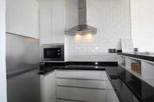 Køkken eller tekøkken på The Blue Corner Penthouse