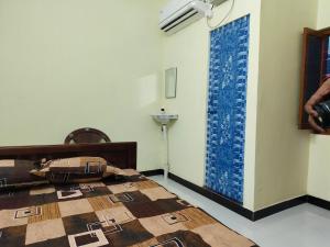 Φωτογραφία από το άλμπουμ του Murugavel Residency σε Vishāram