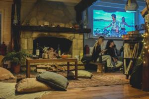 Posezení v ubytování INDÓMITO HOSTEL