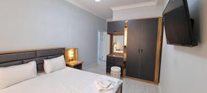 Postel nebo postele na pokoji v ubytování Asia Luxe Apartment