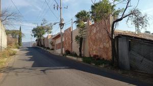 an empty street with a building on the side at New house with pool, excellent, 3 bedrooms in Pazulco