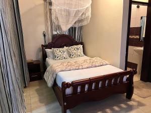 Postel nebo postele na pokoji v ubytování Lakepoint Villa
