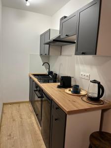 Η κουζίνα ή μικρή κουζίνα στο Apartament w centrum