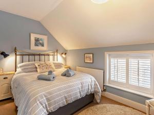 Ένα ή περισσότερα κρεβάτια σε δωμάτιο στο 2 Bed in Snettisham KT105