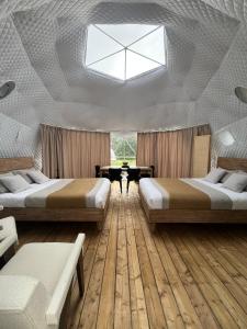 Postel nebo postele na pokoji v ubytování Grotto Getaway
