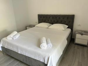 Postel nebo postele na pokoji v ubytování Hotel Krisl