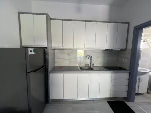 Kuchyň nebo kuchyňský kout v ubytování Hotel Krisl