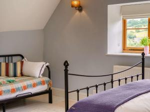 Ένα ή περισσότερα κρεβάτια σε δωμάτιο στο 3 Bed in Crickhowell 48309