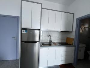 Kuchyň nebo kuchyňský kout v ubytování Hotel Krisl