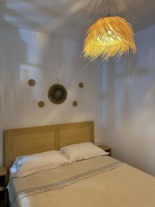 Katil atau katil-katil dalam bilik di Casa Aura Dhermi +6 gambar