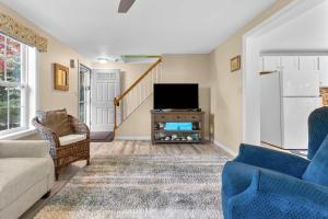 Χώρος καθιστικού στο Summersea - Charming 4 BDR in Golf Community