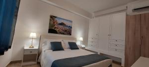 Ένα ή περισσότερα κρεβάτια σε δωμάτιο στο a PICCIRIDDA