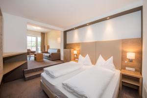 Krevet ili kreveti u jedinici u okviru objekta Spa&Aktiv Hotel Lavendel