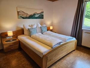 Ένα ή περισσότερα κρεβάτια σε δωμάτιο στο Apartment Iseltal