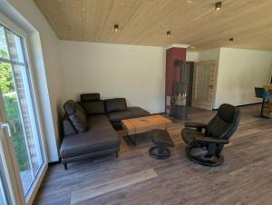 Χώρος καθιστικού στο Ferienwohnung Njord