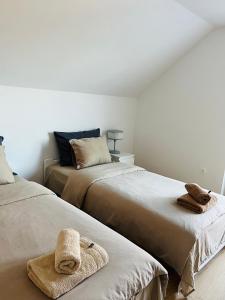 Postel nebo postele na pokoji v ubytování Apartma DUDI